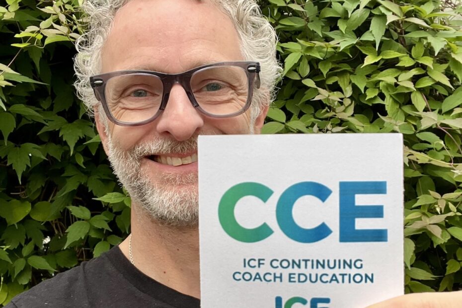 James Farrell smiling with CCE logo