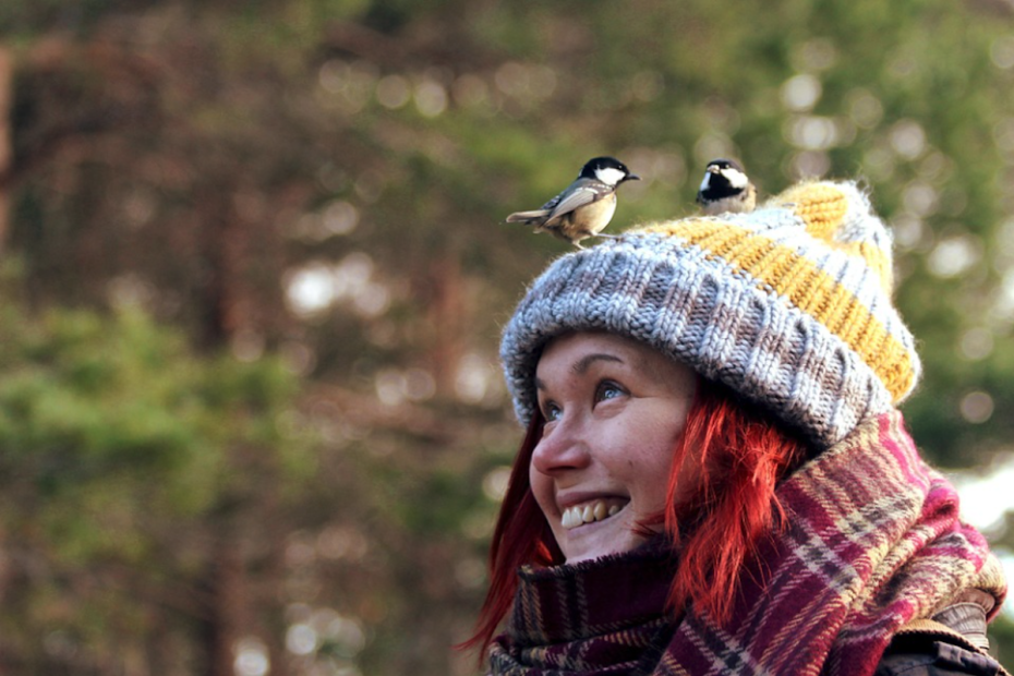woman red hair birds on wooly hat