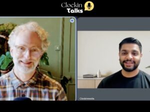 white man brown skinned man smiling on video call